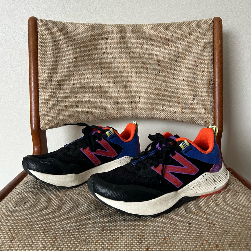New Balance Black and Purple Sneakers with Orange Accents